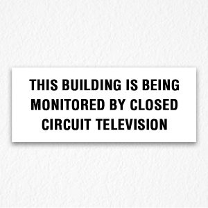 Being Monitored Sign in Black Text