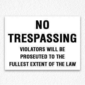 No Trespassing Extent of Law Sign Black Text