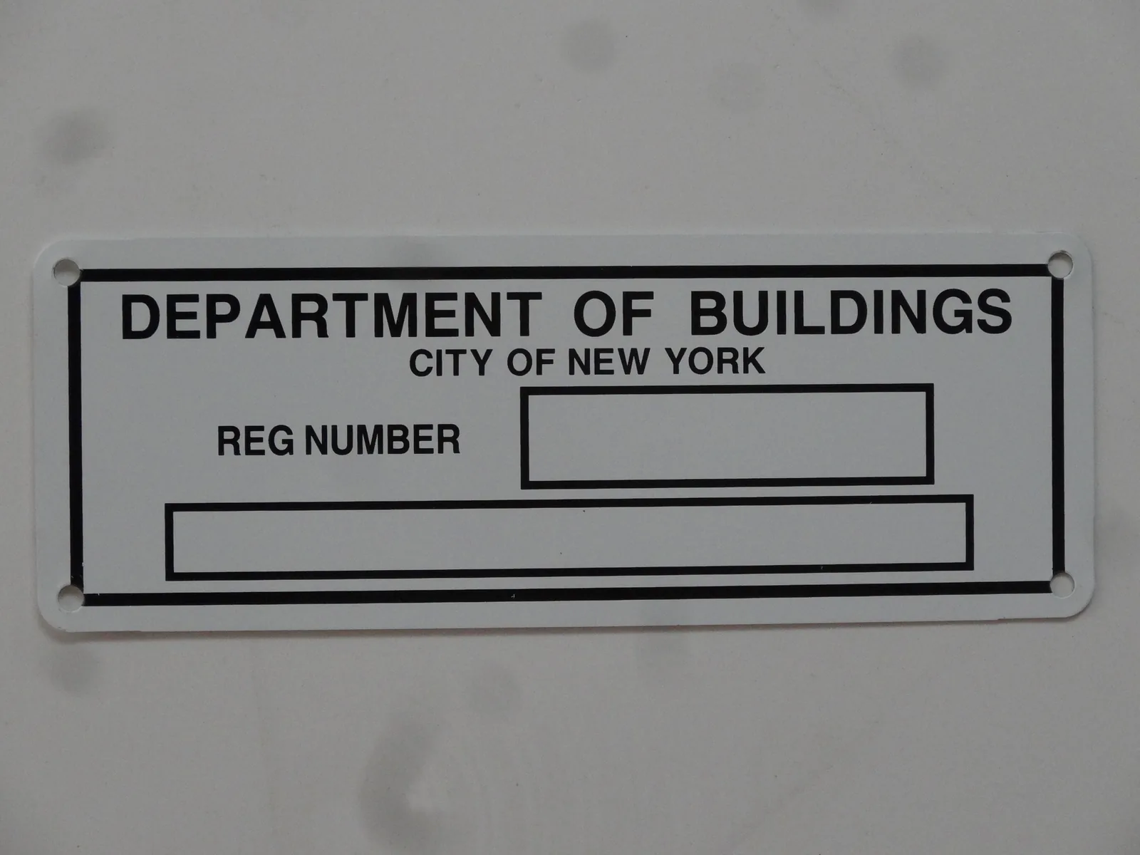 Department of Buildings City of New York registration number sign on aluminum