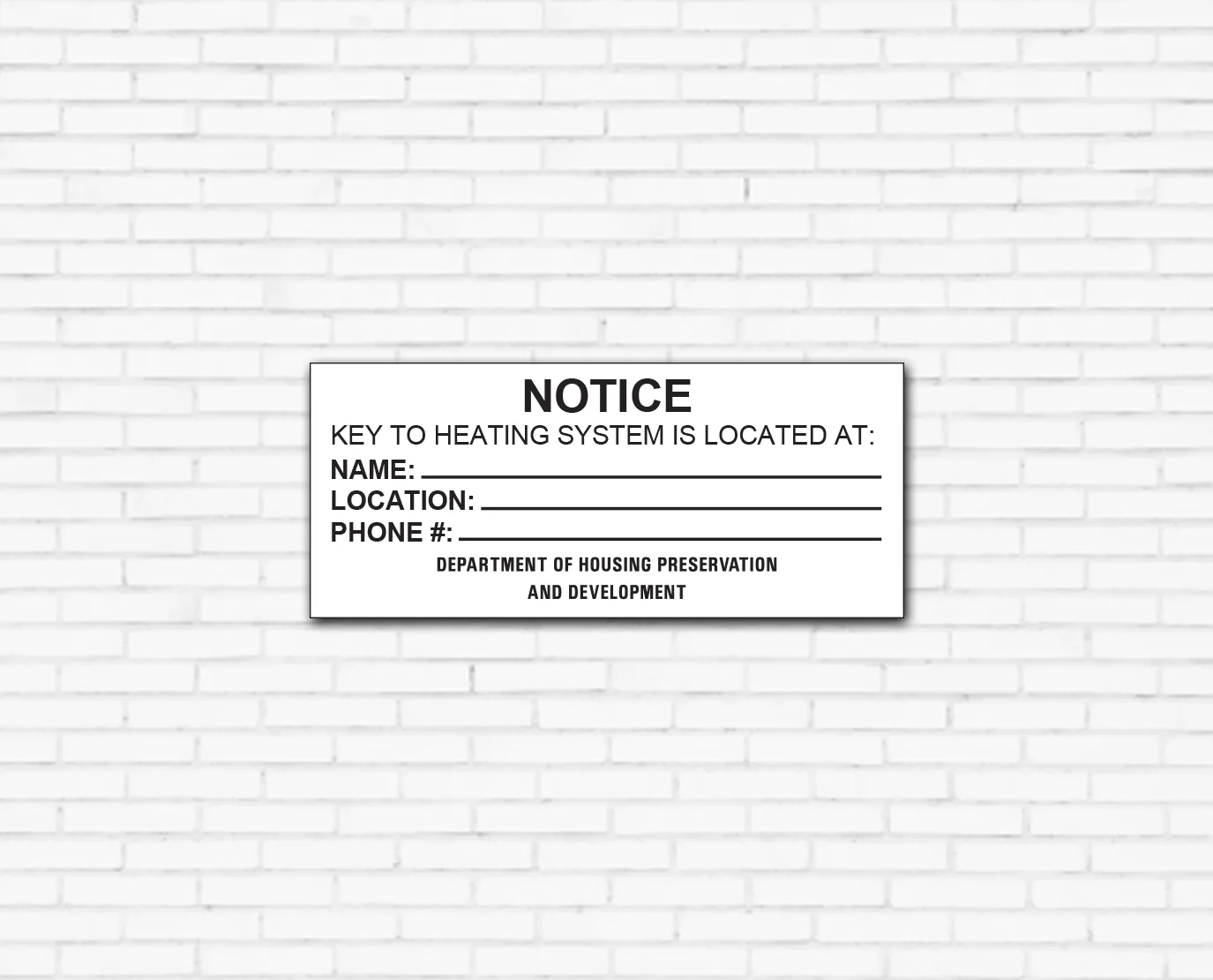 Key to heating system notice showing who holds the boiler room key and where they are located